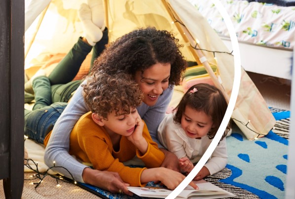 housing services, family reading in bedroom