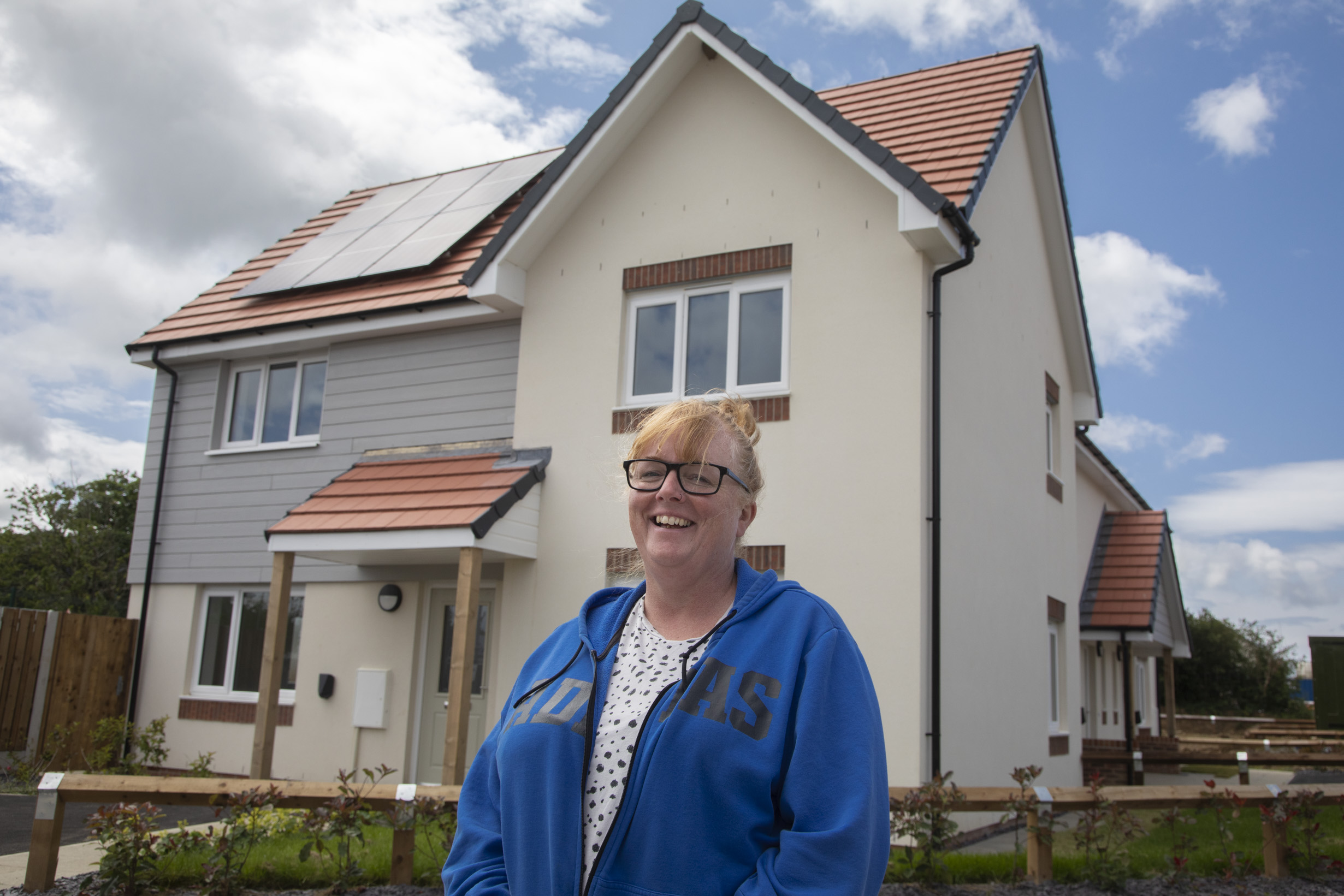 Resident outside new property on Coleg Menai, Llangefni